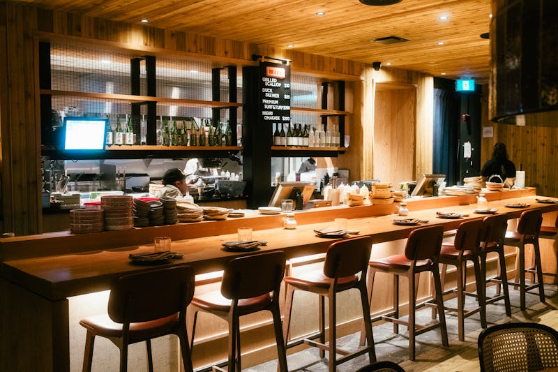 Costa Vida restaurant interior with warm lighting and fresh ingredients